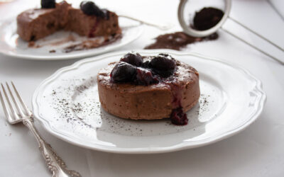 Crustless Chocolate Cheesecake with Dark Red Cherry Sauce